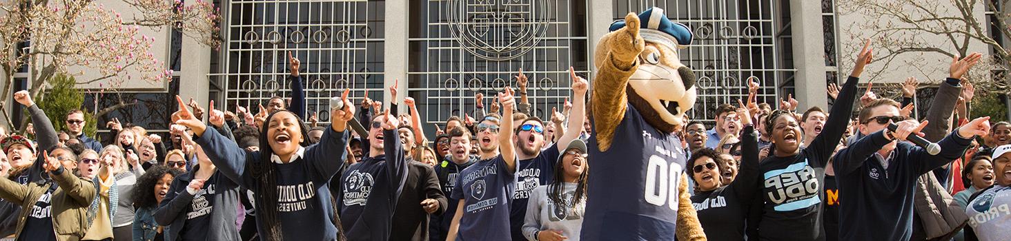 Students cheering with ODU mascot